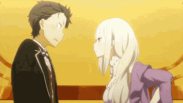 a man in a tuxedo and a woman in a purple dress look at each other