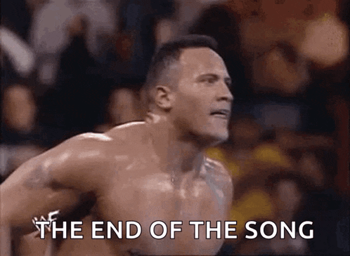 a man without a shirt is jumping in the air with the words `` the end of the song '' written on the screen .