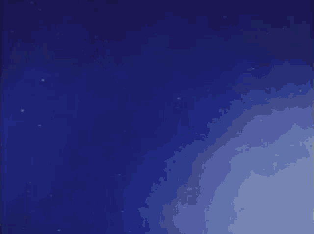 a blue object with the letter t on it is flying through space