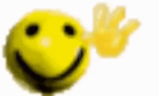 a close up of a yellow smiley face with a hand waving .