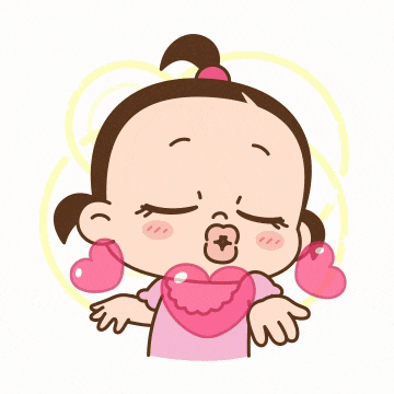 a girl in a pink dress is blowing a kiss