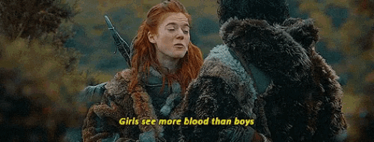 a woman in a fur coat is talking to a man in a fur coat with the words `` girls see more blood than boys '' .