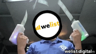 a man in a blue shirt is holding a pair of knives with a welist logo on his face