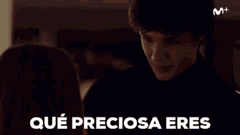 a man and a woman are looking at each other and the man is saying " qué preciosa eres " .