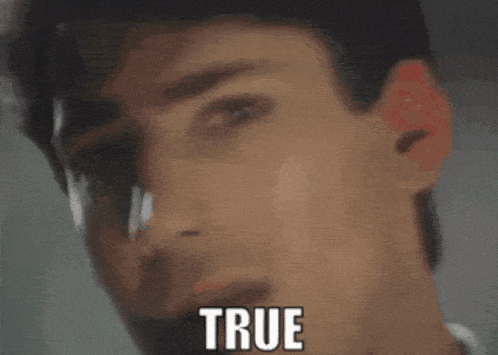 a close up of a man 's face says true