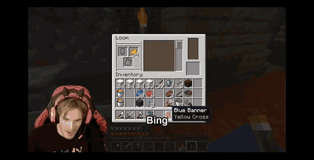 a man wearing headphones is playing a video game with the words bing bing on the screen