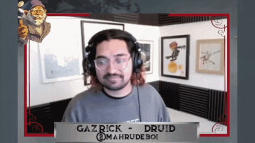 a man wearing headphones and glasses is gazrick druid @mahrudeboi