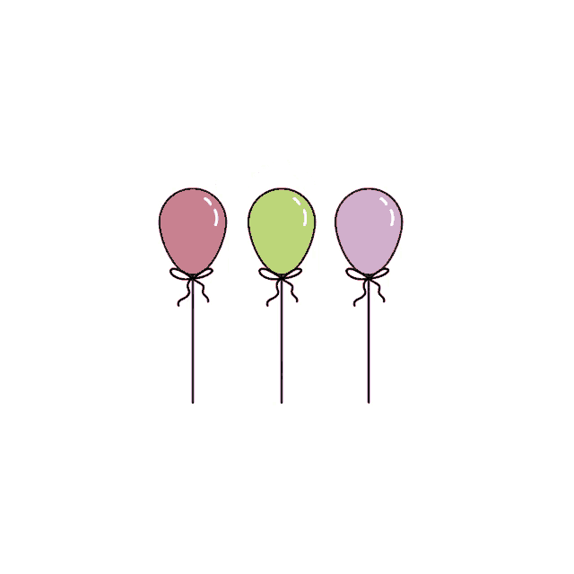 three different colored balloons are lined up in a row