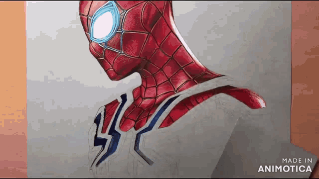 a close up of a drawing of a spiderman on a piece of paper .