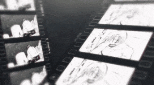 a row of black and white film strips with drawings of people on them