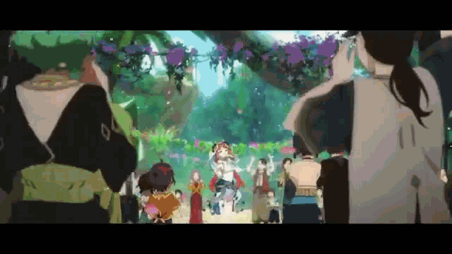 a group of people are standing in a field with purple flowers ..