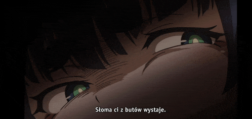 a close up of a girl 's face with the words stoma ci z butow wystaje