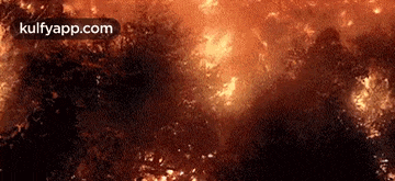 an aerial view of a fire burning in the sky