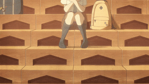 a girl sits on a set of wooden stairs with a backpack