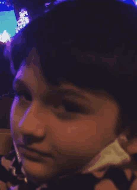 a close up of a child wearing a mask
