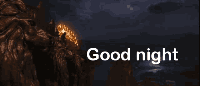 a picture of a statue with the words " good night " below it