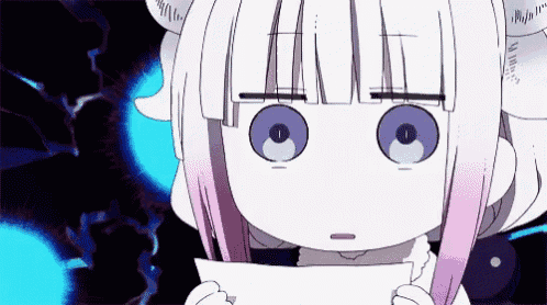 a girl with pink hair and horns is holding a piece of paper in her hands .