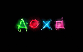 the letters a , o , x , and d are glowing in neon colors on a black background .