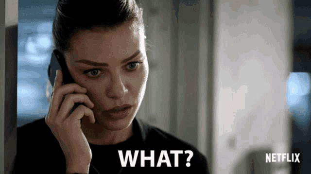 a woman talking on a cell phone with a netflix logo in the corner