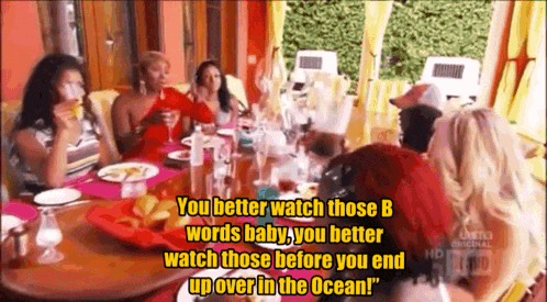 a group of women are sitting around a table with a caption that says " you better watch those b words baby