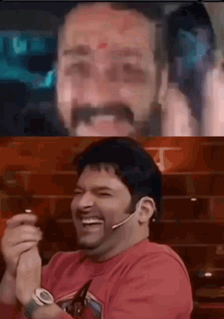 a man in a red shirt with a microphone on his head laughs