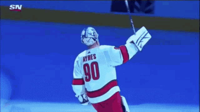 a hockey player with the number 90 on his back