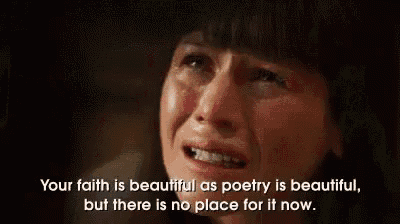 a woman is crying with a quote that says `` your faith is beautiful as poetry is beautiful , but there is no place for it now