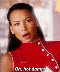 a woman in a red top is saying `` oh , hot damn '' .