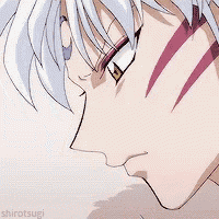 a close up of a person 's face with white hair and red stripes on his face .