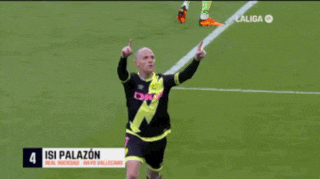 a soccer player wearing a number 7 jersey stands on the field