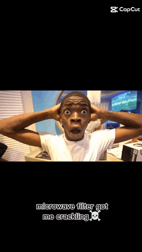 a man making a funny face with the caption microwave filter got me cracking