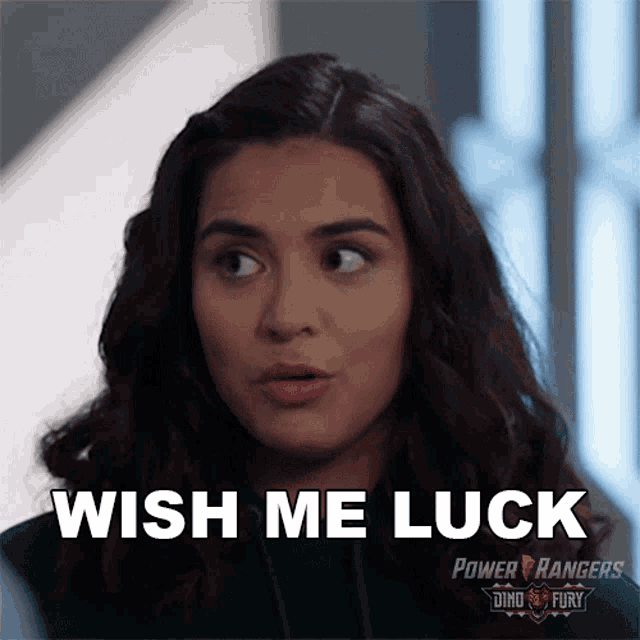 a woman from power rangers says wish me luck on her face
