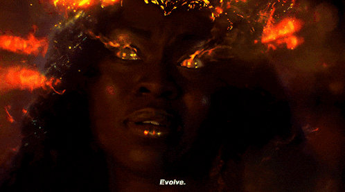 a close up of a person 's face with the words " evolve " written below it