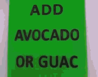 a green sign that says avocado or guacamole on it