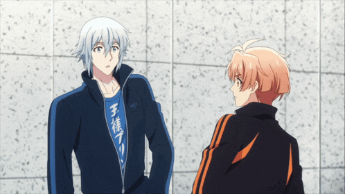 two anime characters are standing next to each other with one wearing a blue shirt that says ' ' ' ' on it