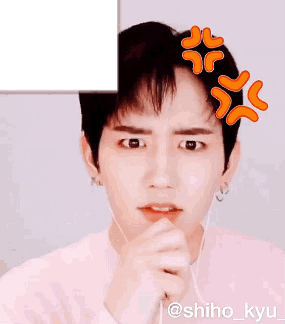 a young man wearing ear buds is making a funny face with the words nani written above him