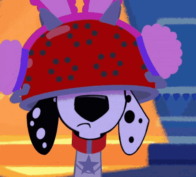 a dalmatian wearing a red helmet with purple ears