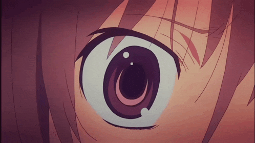 a close up of a person 's eye with a purple circle in it