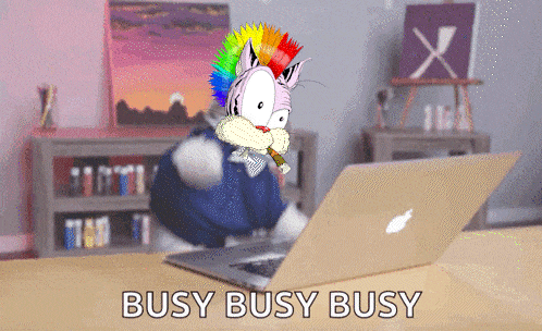 busy busy busy is displayed on the screen of a laptop computer