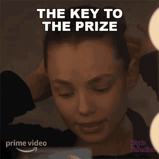 a woman in front of a mirror with the words " the key to the prize "