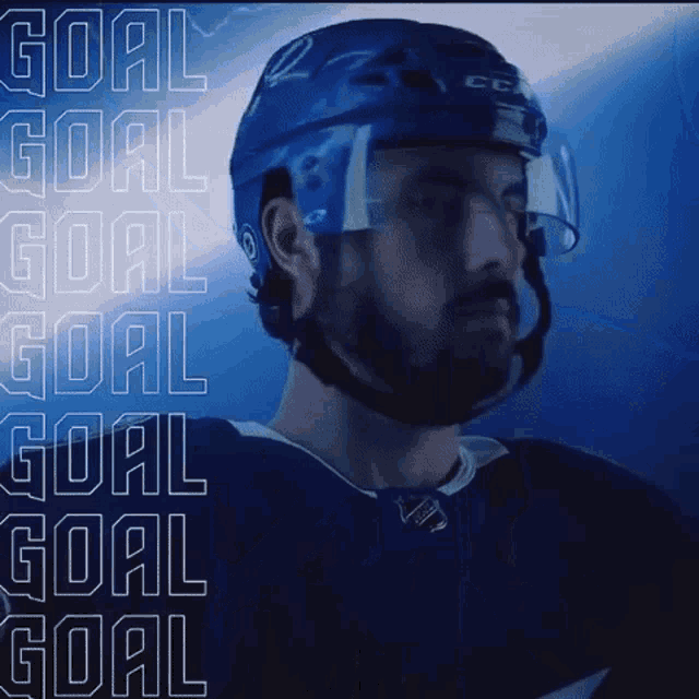 a hockey player wearing a helmet with the words goal goal goal goal on the bottom right