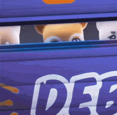 a cartoon character looks out of a window with the word dec on the side