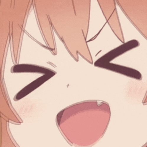a close up of a girl 's face with her mouth open