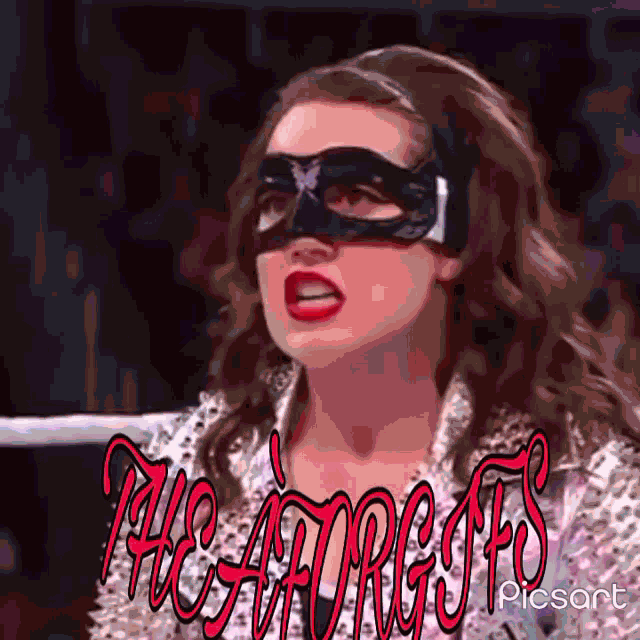 a woman wearing a mask with the words " the forgives " on the bottom right