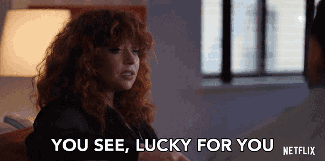 a woman with red hair says " you see lucky for you netflix "