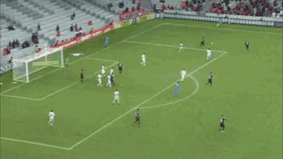 a soccer game is being played in a stadium with an ad for bennet