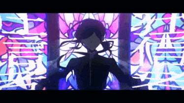a man in a black suit is standing in front of a stained glass window .