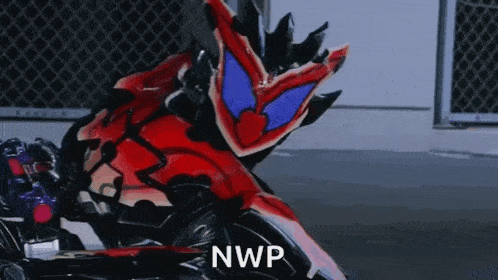 a person in a red and black costume is riding a motorcycle with the words `` nwp '' written on it .