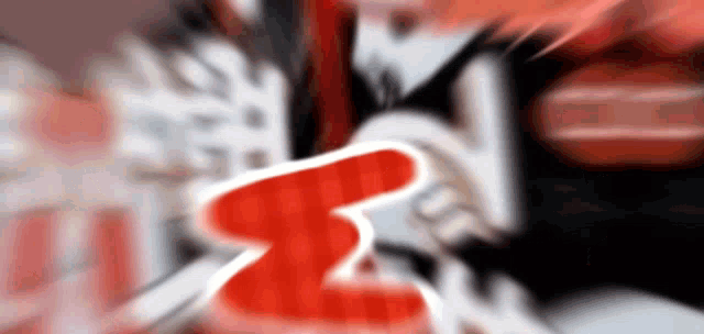 a blurry picture of a person 's face with the letter s in the foreground .