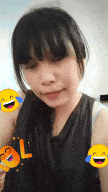 a girl with a black tank top is surrounded by laughing emoticons and the word lol